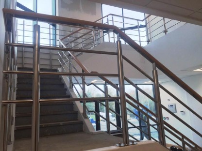Stainless steel balustrading with timber handrail to new offices in Southampton.
