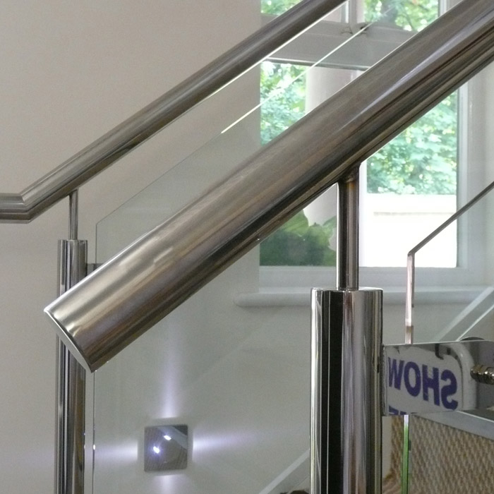 stainless steel balustrading with glass infills to new staircase in new contemporary flats in Dorset.