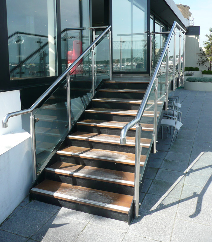 Mild steel staircase with stainless steel balustrade and glass infill's to a restaurant in Sandbanks, Poole