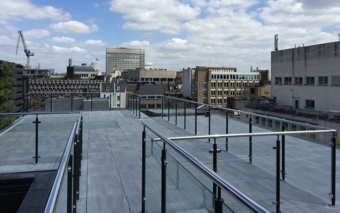 Mild Steel powder coated balustrading to roof terrace on Oxford Street, london