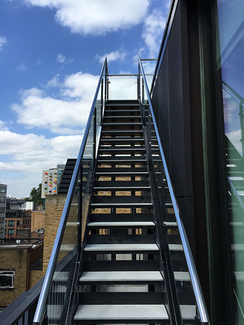 Mild Steel powder coated balustrading to roof terrace on Oxford Street, london