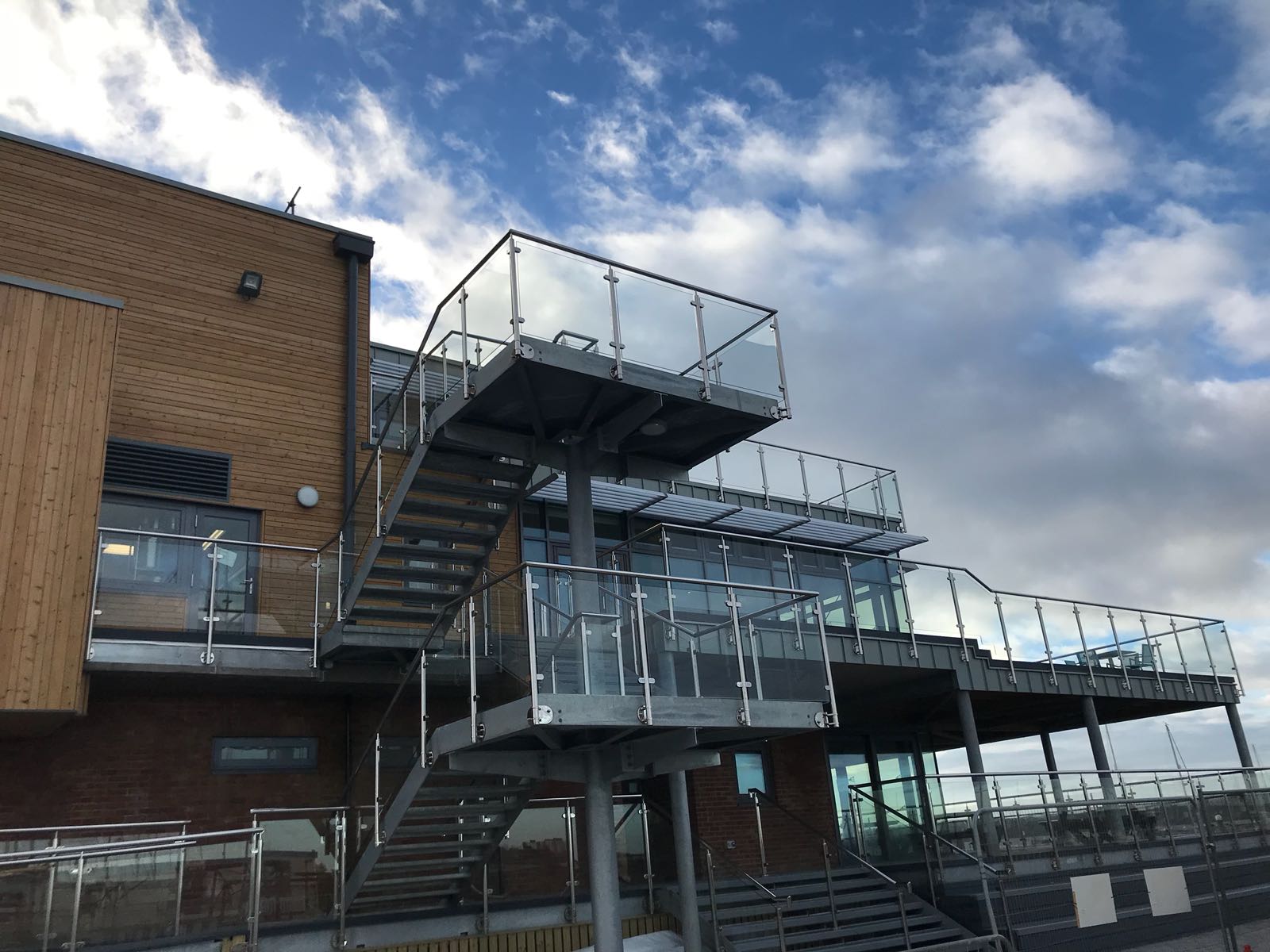 Exterior Multiple level Bespoke staircase with stainless barricade for a venue in Parkstone.