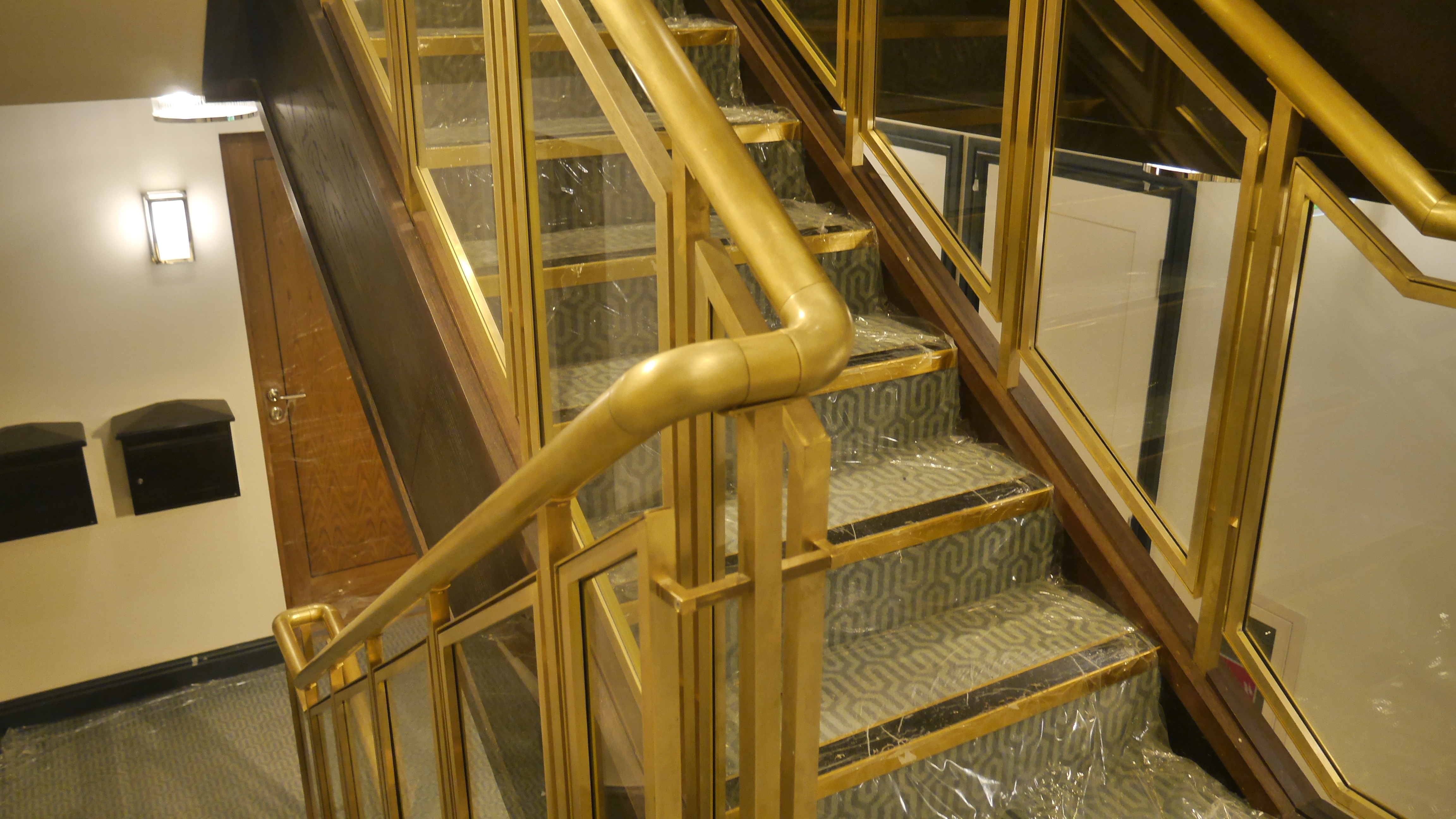 Bespoke Steel and Brass Staircase balustrade for residential properties in London.