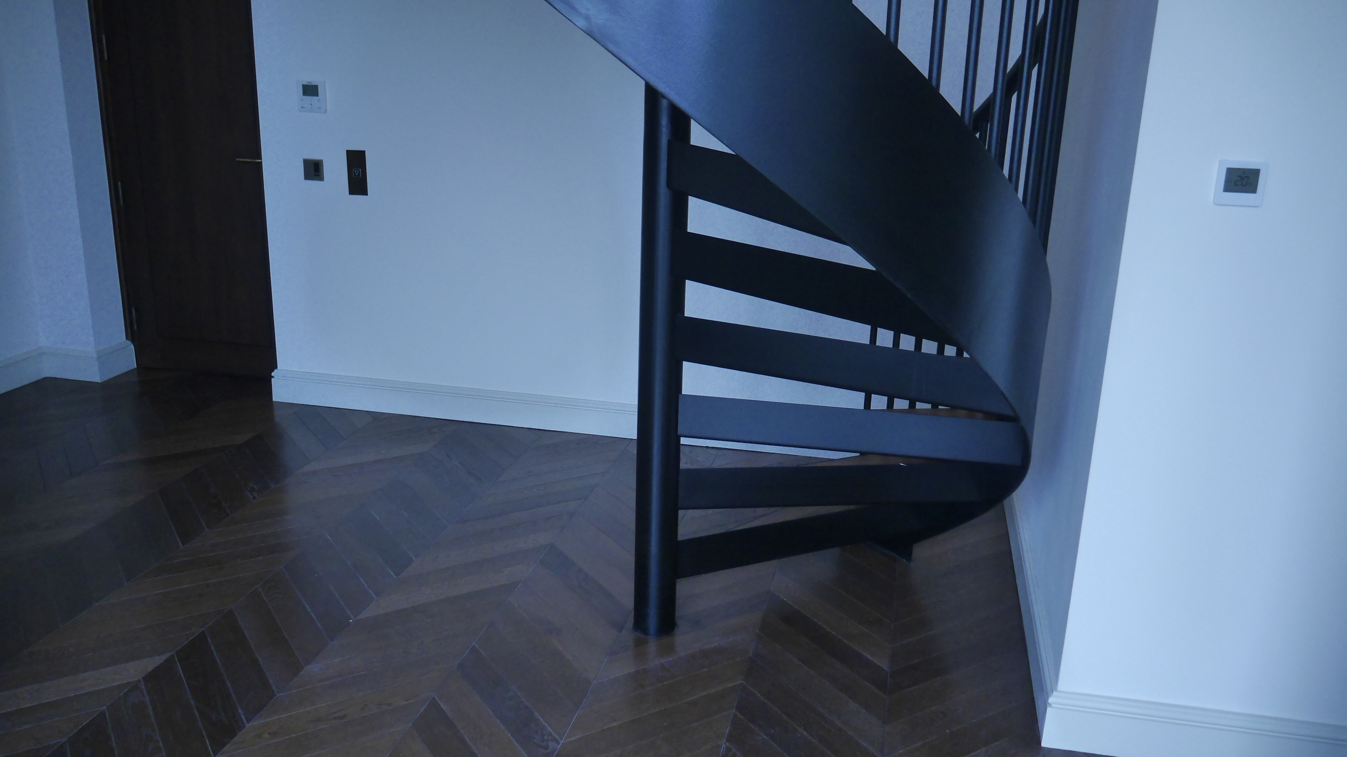 Bespoke Black Mild Steel Spiral Staircase for residential penthouse apartment in London.