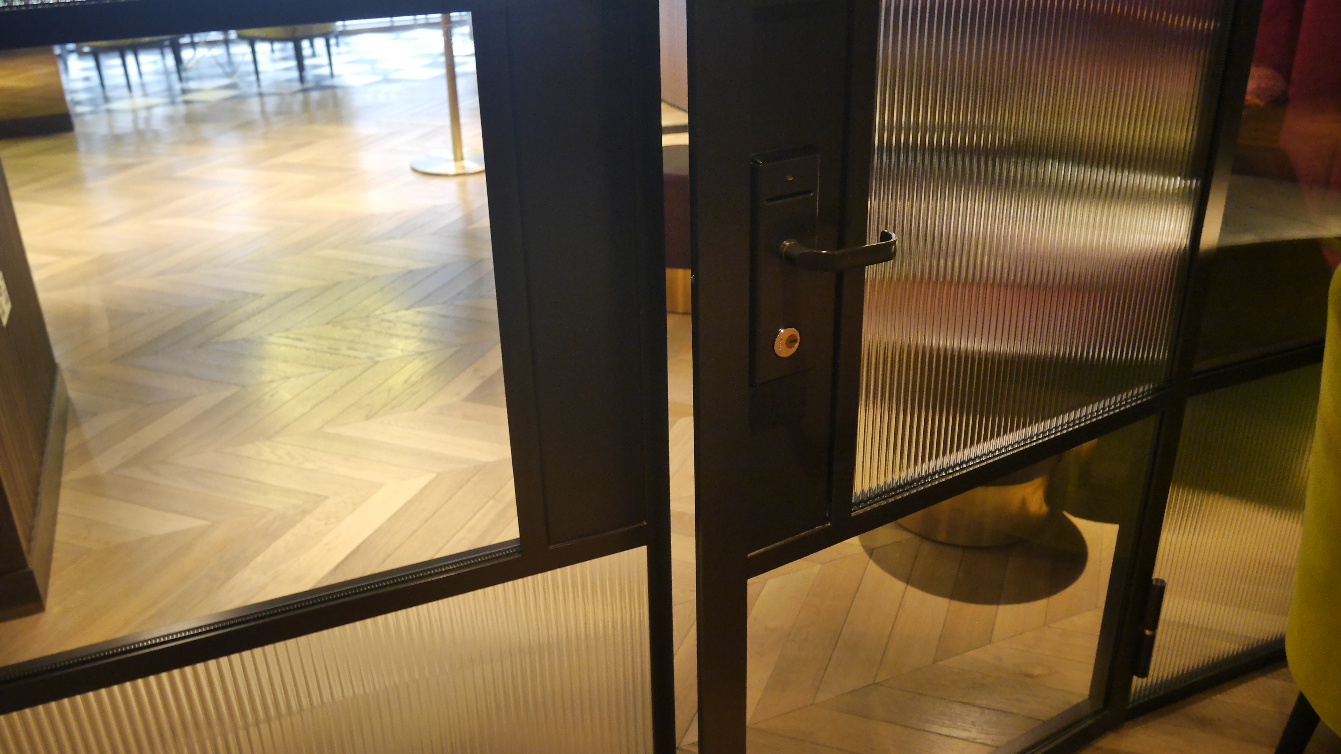 Wall dividing screens between rooms at a Hotel in London.